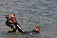 Rescue Divers helps a diver from the water